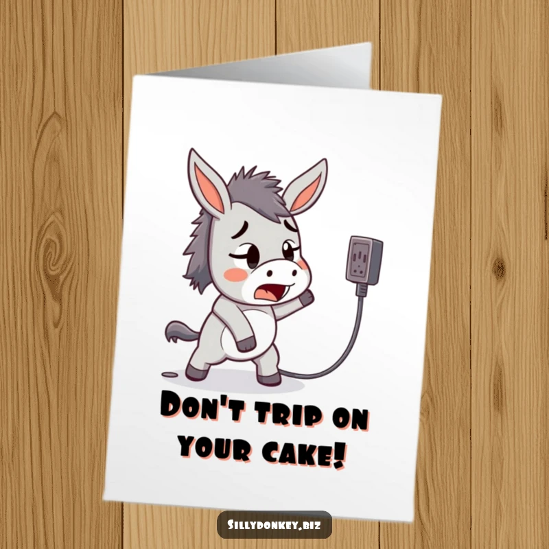 Funny Free Printable Birthday Card: Kawaii donkey startled after tripping over a power cord, a funny depiction of minor mishaps.