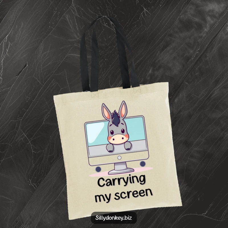 Funny tote bag with a kawaii donkey character peeking over a computer monitor, ideal for carrying essentials with a tech-themed humor.